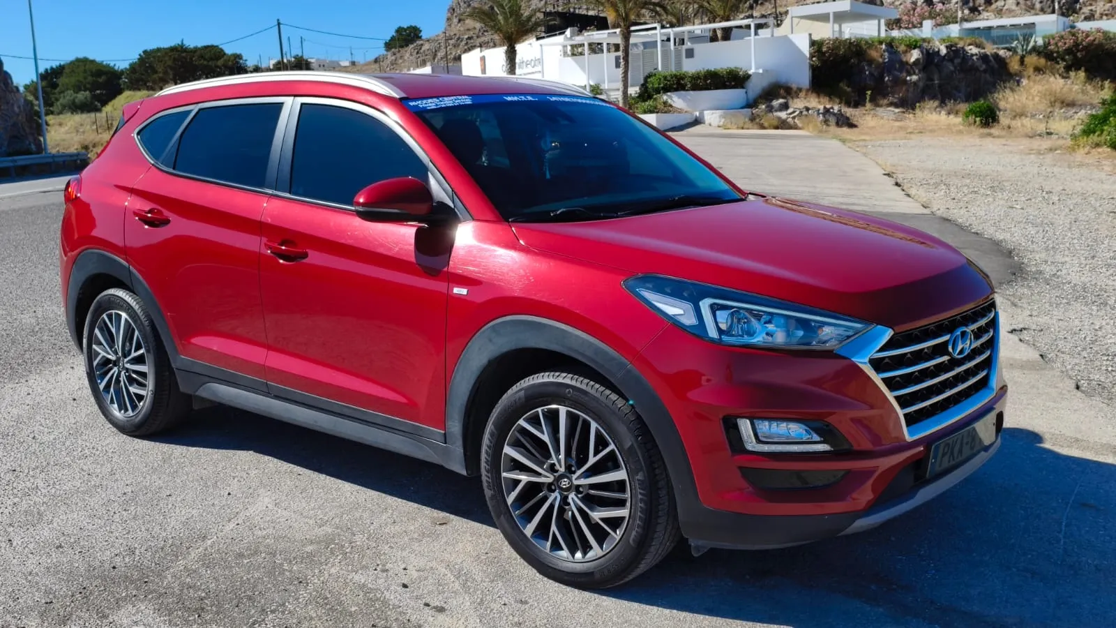 Red Hyundai Tucson private transfer SUV in Rhodes