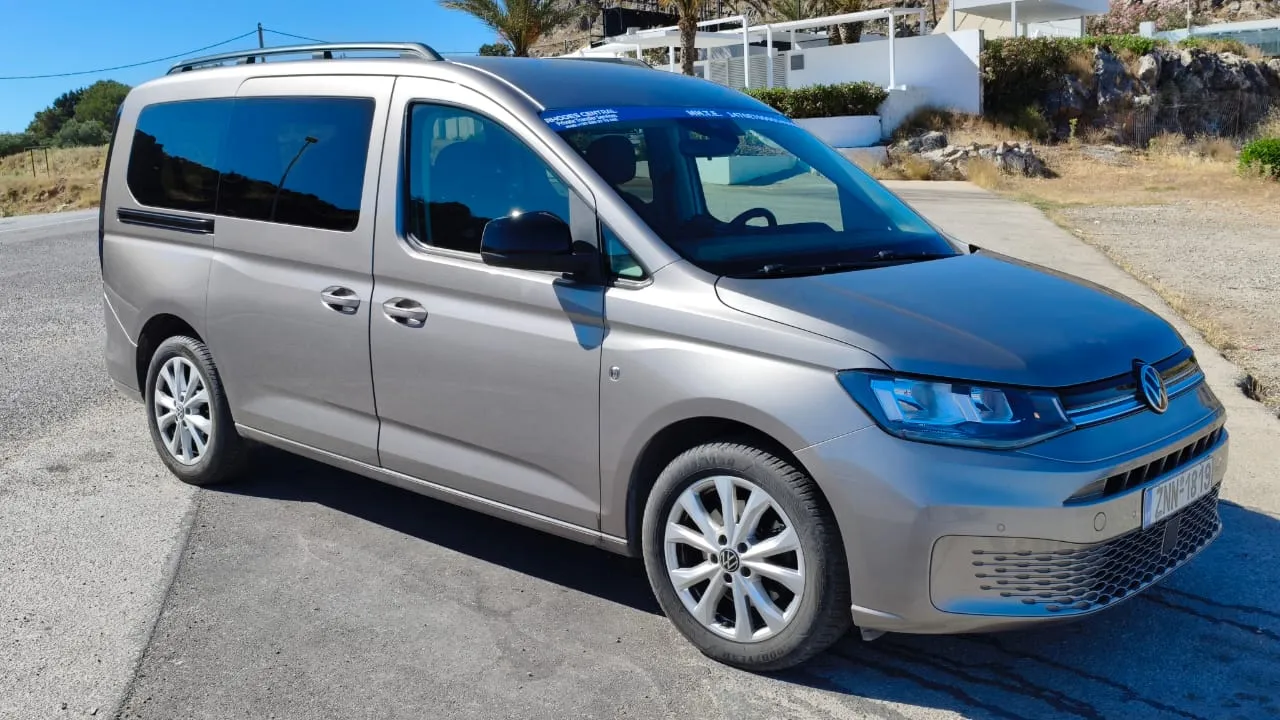 Grey Volkswagen Caddy family transfer van
